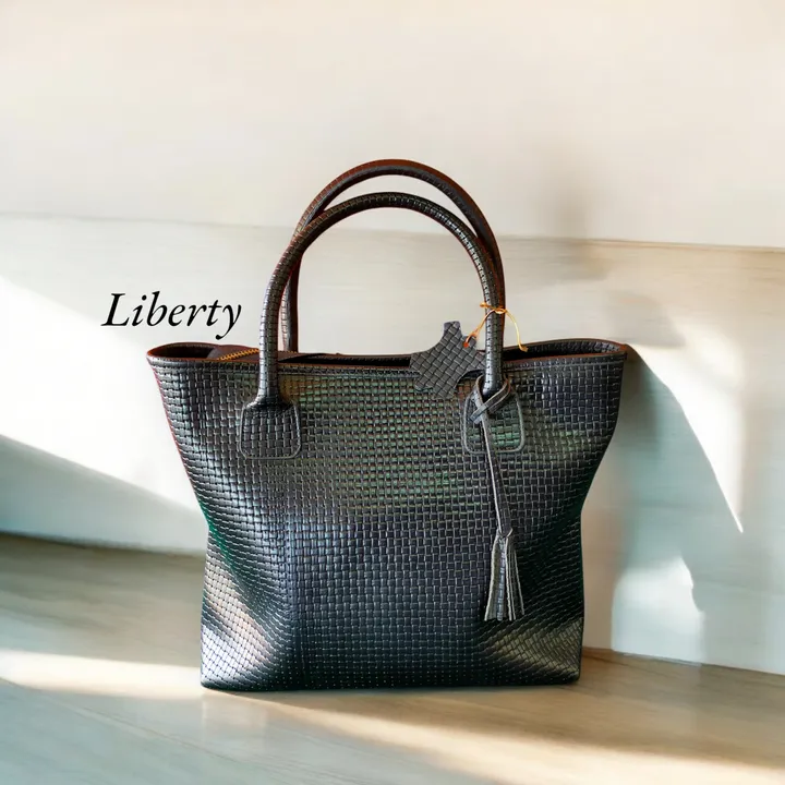 Tas embos motif anyaman