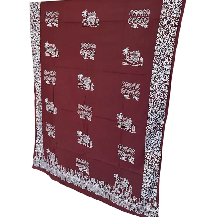 Kain batik katun cap talempong dan rumah gadang