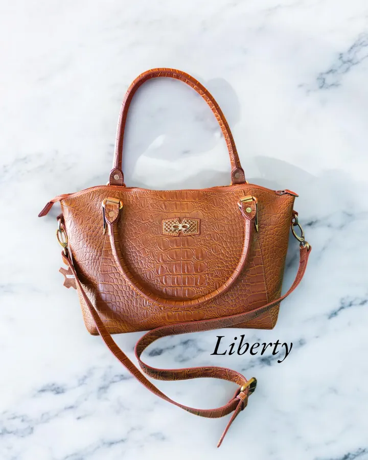 Tas embos motif kulit buaya