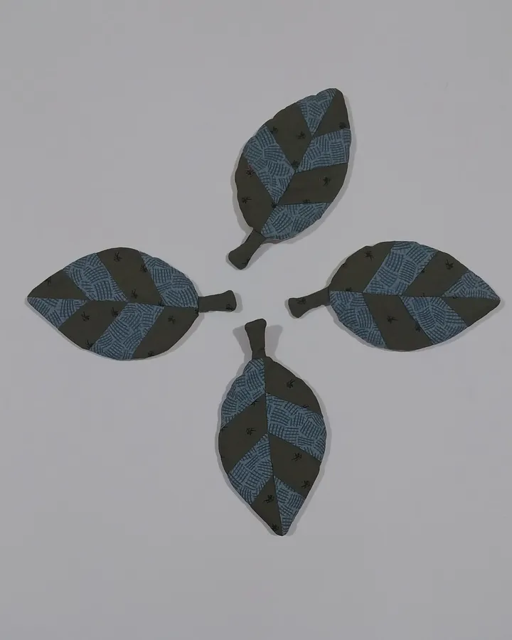 Tatakan gelas motif daun warna hijau